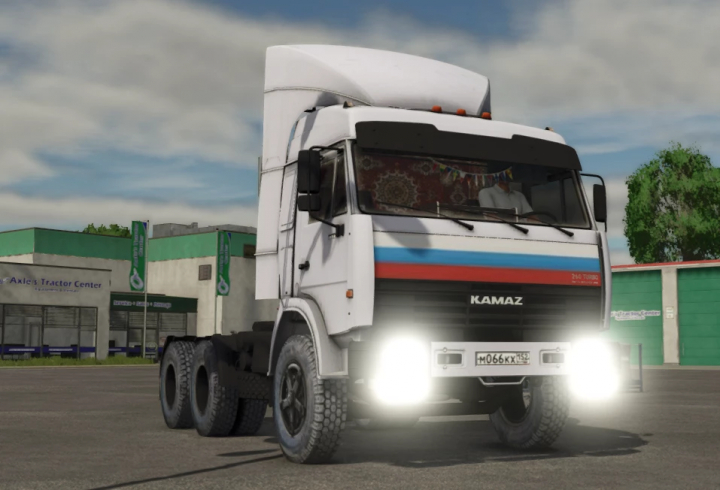 fs25-mods, Farming Simulator 25 mod: KamAZ 54115 truck with headlights on, featuring detailed cab and rugged tires.