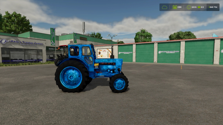 fs25-mods,  Farming Simulator 25 mod: Blue LTZ 40 tractor, featured in a parking lot outside Axle's Tractor Center, for farming and agricultural gameplay.