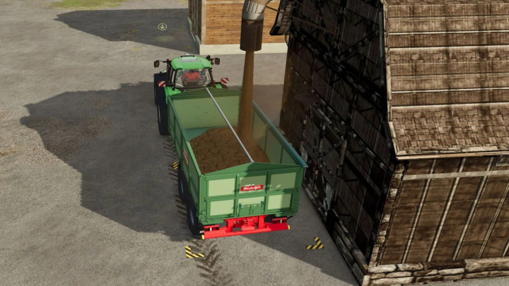 fs25-mods, Farming Simulator 25 mod: loading straw into a trailer near a wooden barn with a hoist.