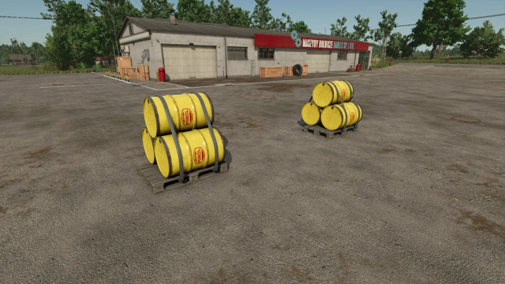 fs25-mods, Farming Simulator 25 mods: Two pallets of yellow Minol fuel barrels on an outdoor lot next to a workshop building.