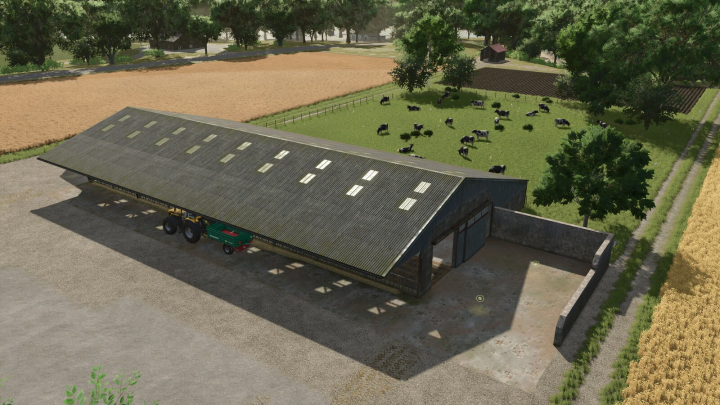 fs25-mods, Farming Simulator 25 mod: Old Stable v1.0.0.0, a large barn for livestock storage with a tractor and trailer, set in a rural farm environment.