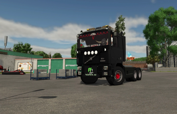fs25-mods, Black Volvo F12 truck mod from Farming Simulator 25, detailed with custom decals and lights, in a parking lot environment.