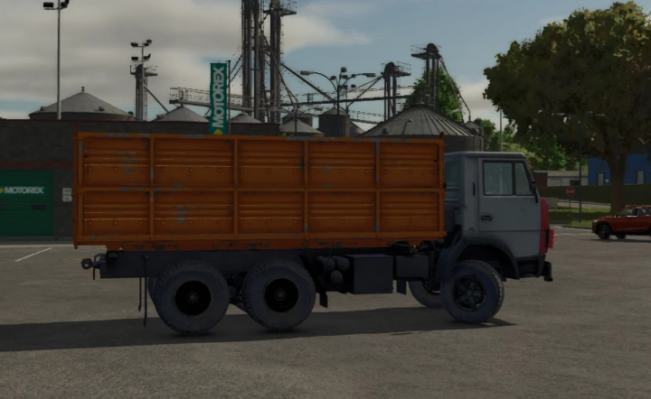 fs25-mods, Farming Simulator 25 mod - KamAZ 55102 truck with wooden cargo bed, parked in an urban setting.