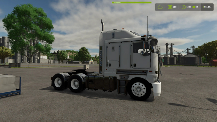 fs25-mods, Farming Simulator 25 mod featuring a white Kenworth truck on a farm yard, ideal for FS25 mods and Farming Simulator 25 mods.