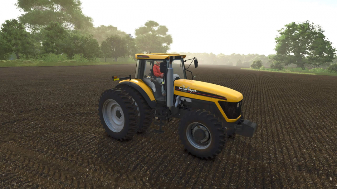 Farming Simulator 25 mod: Yellow Challenger Challenger MT665B tractor in a field with trees and clear sky, part of the FS25 mods collection.