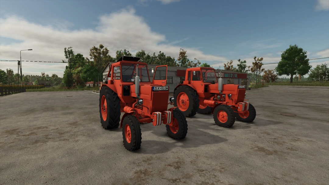 Two Belarus MTZ 80 tractors from FS25 mods in Farming Simulator 25, parked on a dirt lot with trees and buildings in the background.
