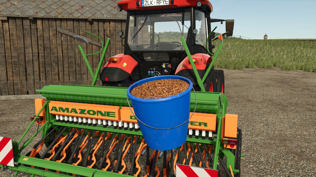 Farming Simulator 25 mods: Buckets Pack v1.1.0.0 with a green agricultural implement and a blue bucket filled with grains in front of a tractor.