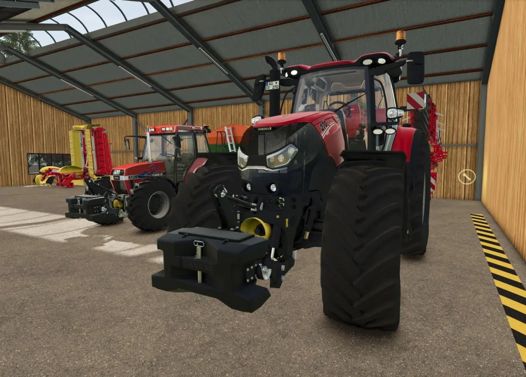 Inside a farm shed with red Case IH tractor and other farming machinery, showcasing mods from Farming Simulator 25, including the Case IH Optum AFS.