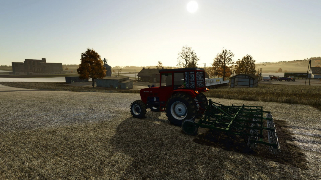 Farming Simulator 25 mod: Red tractor with Combinator RO v1.0.0.0 attached, working on a farm field during sunset.