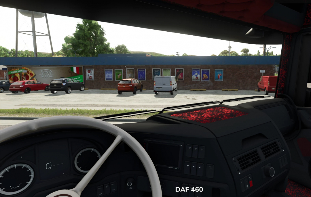 Inside view of a DAF XF106 truck from Farming Simulator 25, showing the dashboard and parking lot outside.