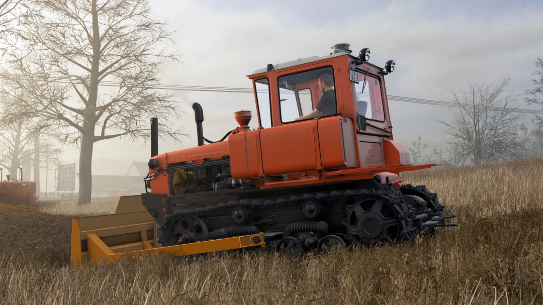 Farming Simulator 25 mod DT-75 v1.0.0.0, a tracked tractor clearing a field with a blade attachment, set in a rural farm environment.