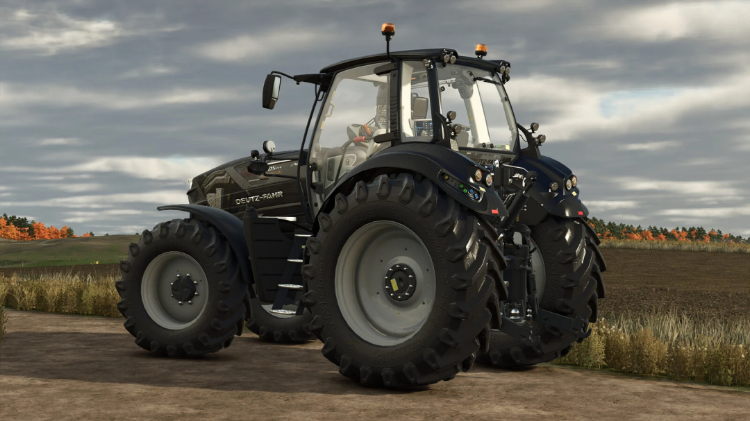 Deutz-Fahr 6215 TTV tractor mod from Farming Simulator 25, off-road on a farm field with a cloudy sky.