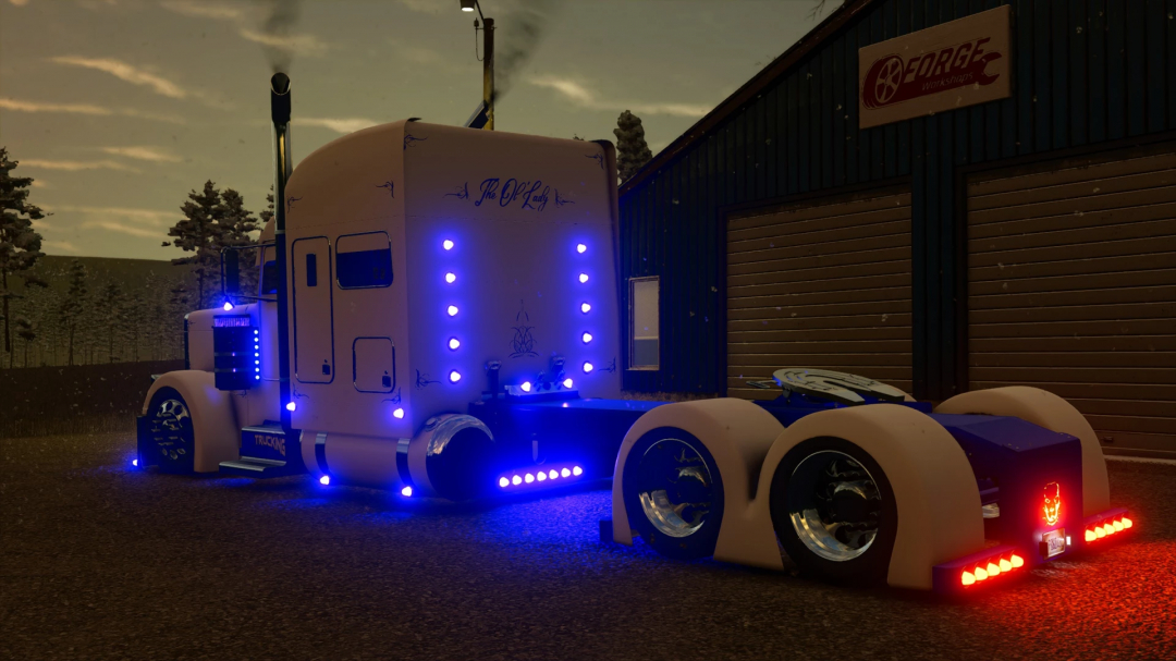 Farming Simulator 25 mod: customized truck with neon blue and red lights, parked outside a workshop for the EXP25 Project Pete v2.0.0.0 mod.