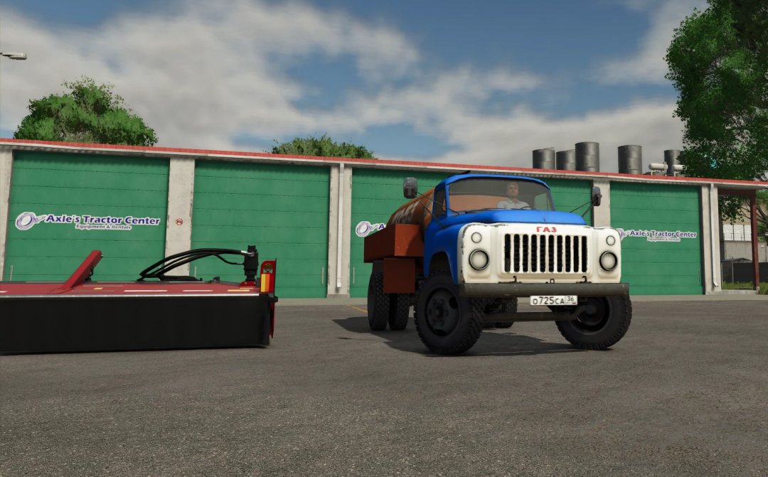 Farming Simulator 25 mod GAZ 53KO truck parked at Axle's Tractor Center in the game.