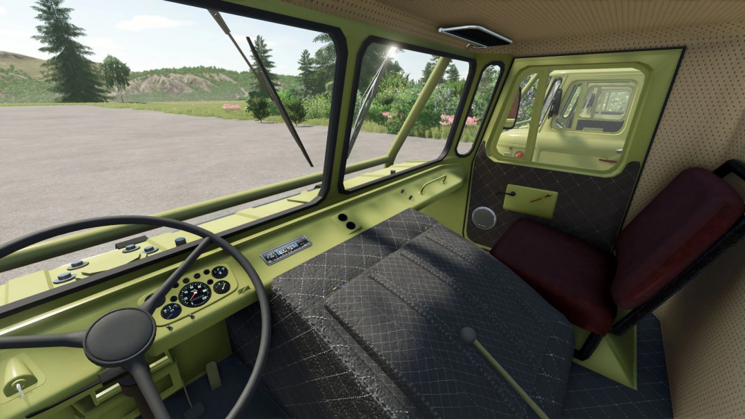 Inside the cab of the GAZ 66 Pack v1.0.0.0 mod in Farming Simulator 25, showing the steering wheel, dashboard, and passenger seat.