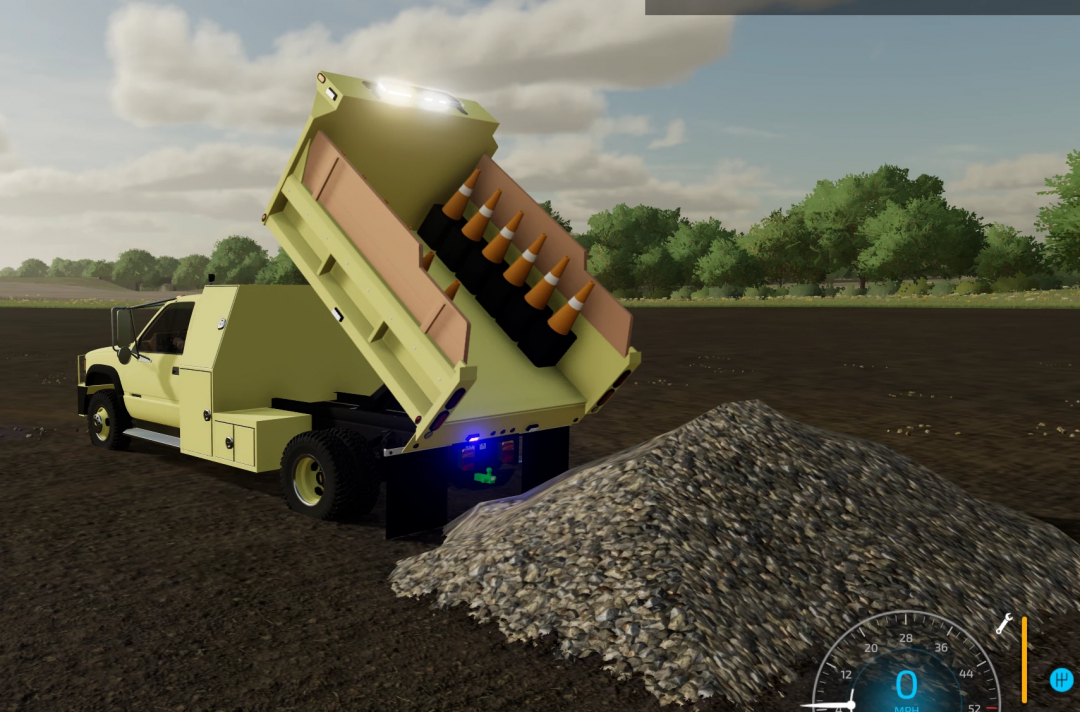 Farming Simulator 22: Dump truck with traffic cones loading gravel on a farm mod.
