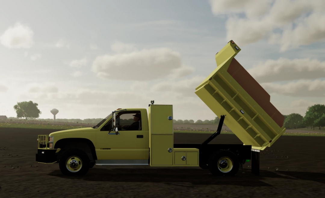 Farming Simulator 22 mod: GMT400 Dumptruck ND v1.0.0.0 in-game screenshot, showcasing a dump truck with a tilting bed.