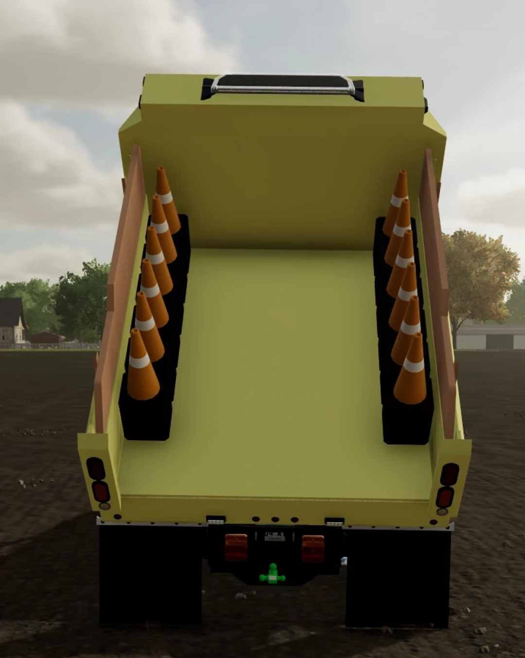 Farming Simulator 22 mods: Yellow dump truck with traffic cones for construction or roadwork, part of GMT400 Dumptruck ND v1.0.0.0.