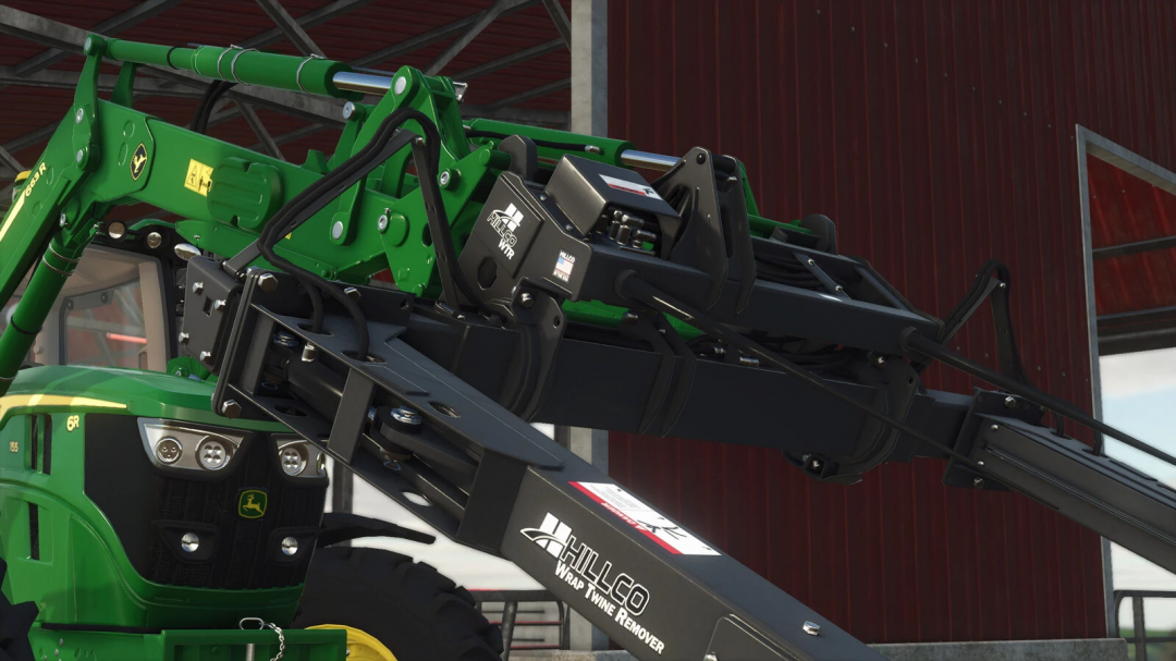 Close-up of a green John Deere tractor with a black Hillco Wrap Twine Remover mod attachment, used in Farming Simulator 25.