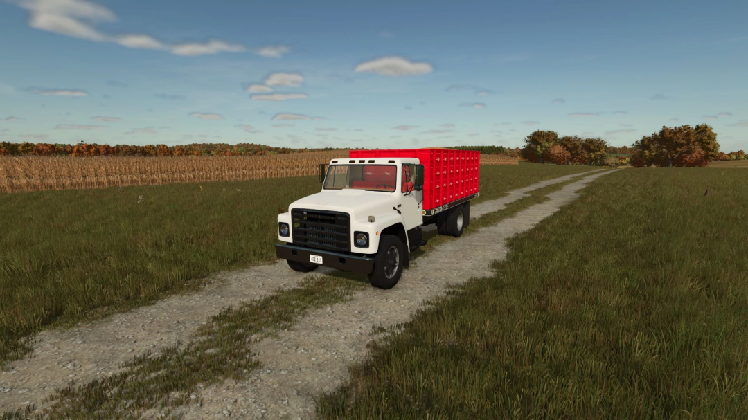 Farming Simulator 25 mod: International S1800 truck with red container driving on a dirt road in a rural field.