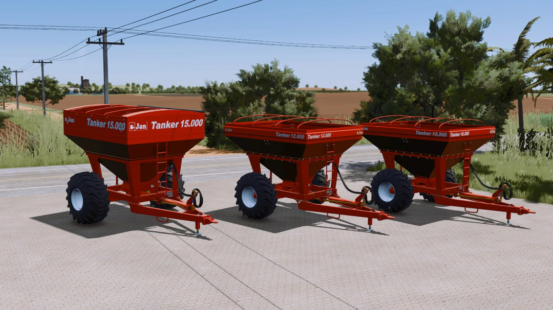 Three red Jan Tanker small series fertilizer spreaders for Farming Simulator 25, displayed on a paved surface outdoors.