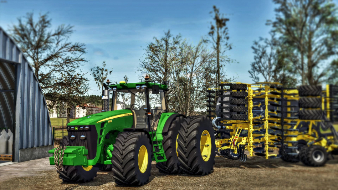 Farming Simulator 25 mod: John Deere 8530 tractor with yellow farming equipment, detailed outdoor farm scenery.