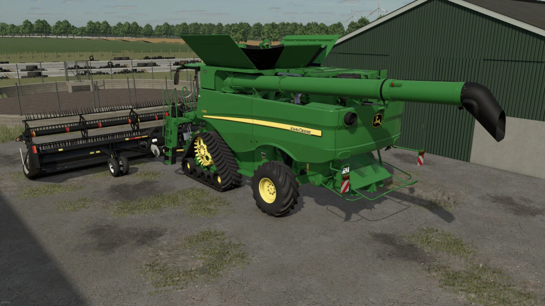 John Deere S790 EU v1.0.0.0 mod in Farming Simulator 25, large green forage harvester near a green barn, detailed agricultural machinery.