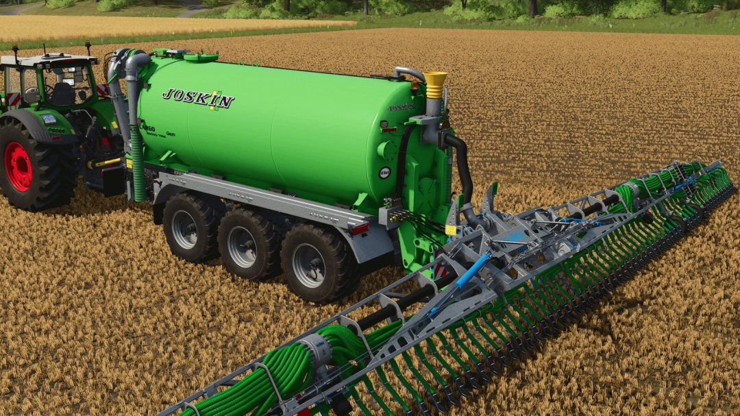 Farming Simulator 25 mod: Joskin Cargo tanker with a green tank and mounted sprayer in a wheat field
