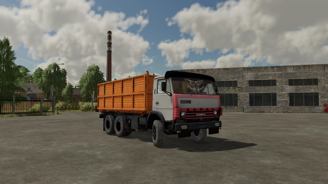 Farming Simulator 22 mod: KamAZ 5320 truck with orange cargo bed in an industrial area.