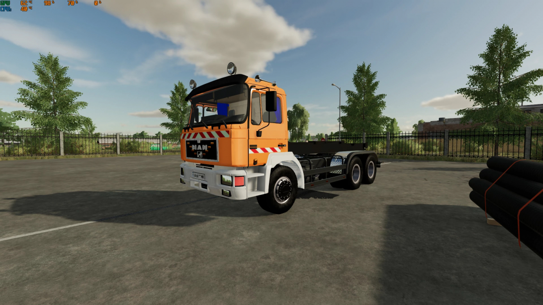 Farming Simulator 22 mod featuring the MAN 26.372 truck, shown in an outdoor setting with trees and a clear sky.