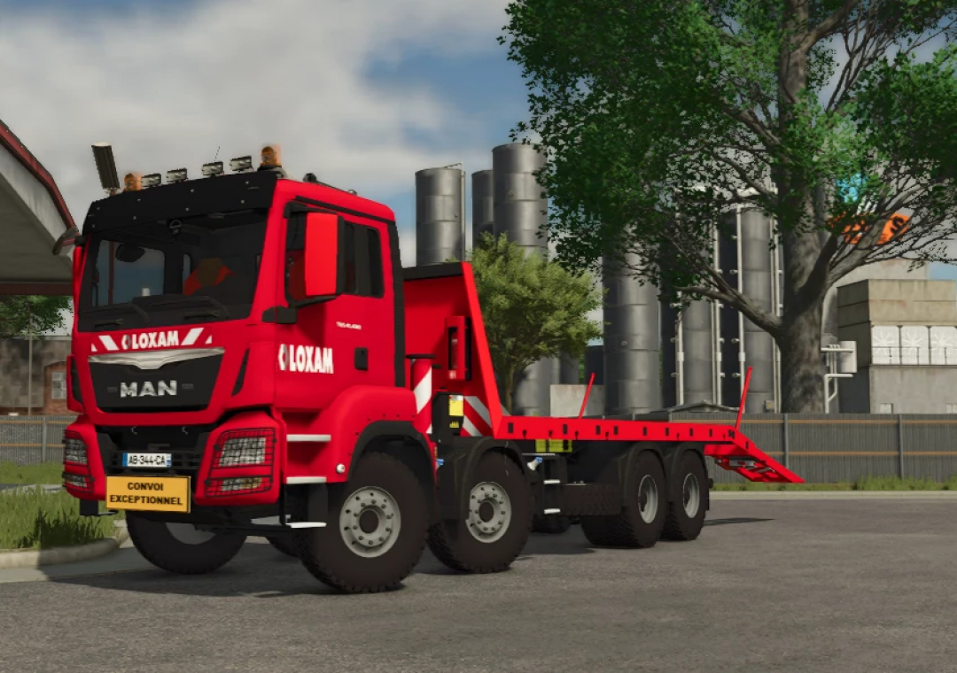 Farming Simulator 25 mod: Red MAN TGS heavy-duty truck with LOXAM branding, used in FS25 for equipment transport.