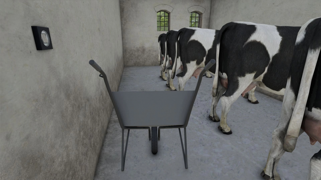 Farming Simulator 25 mod: Inside a cow shed with dairy cows and a wheelbarrow, part of the Post German Cow shed v1.0.0.0.