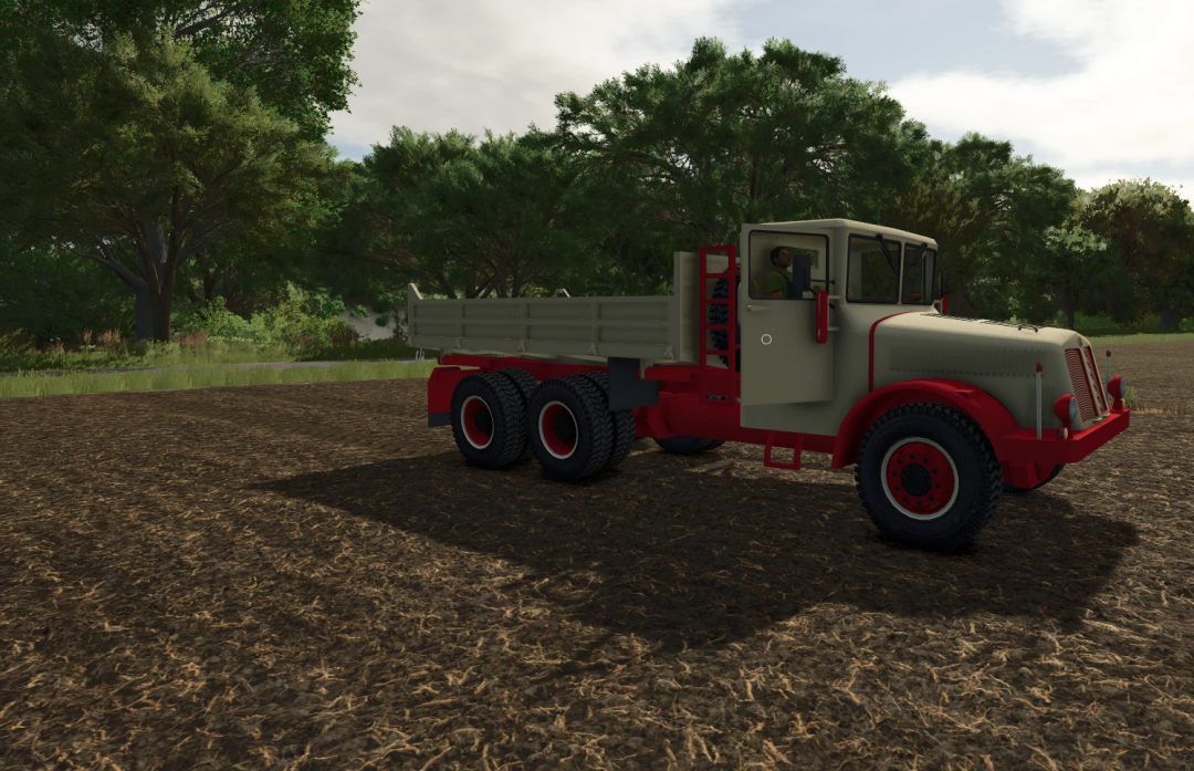 Farming Simulator 25 mod: TATRA t111 truck on a farm field with trees in the background.