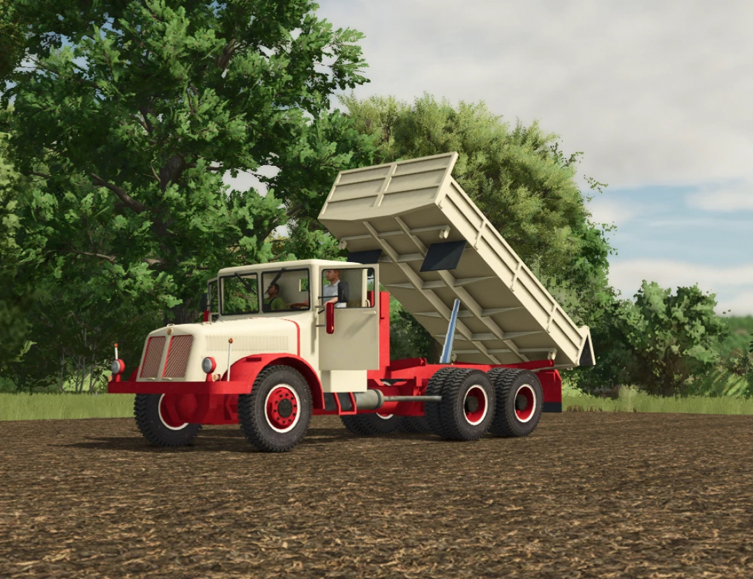 Farming Simulator 25 mod: TATRA t111 dump truck on farmland with a raised bed, surrounded by green trees.