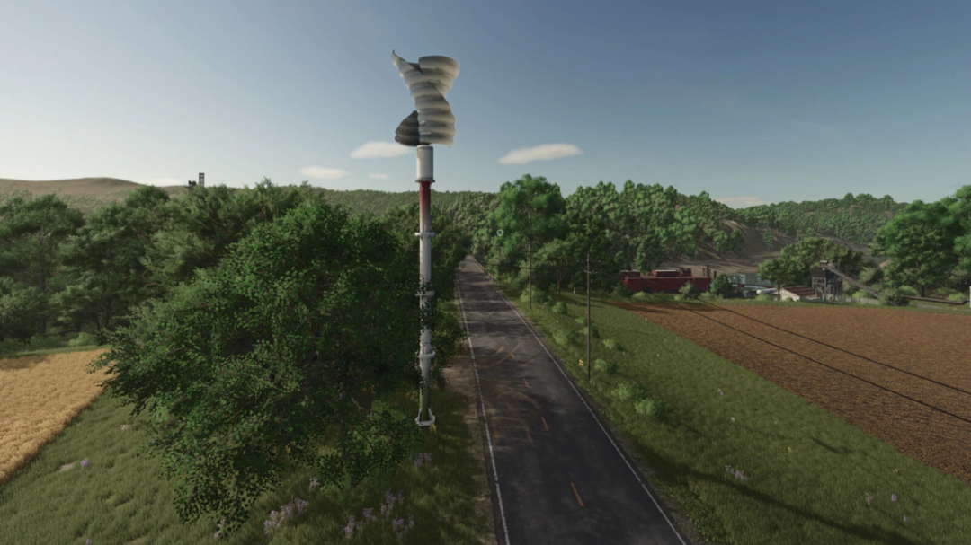 In-game scene from Farming Simulator 25 showing a tall vertical wind turbine mod by Lizard H15 in a rural landscape with fields and trees.