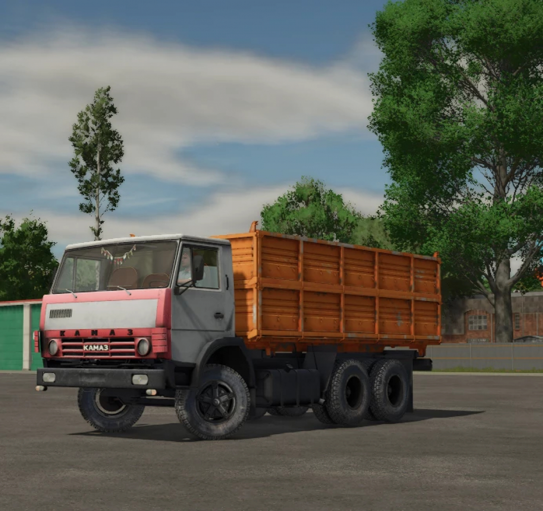 Farming Simulator 25 mod: KamAZ 55102 truck with a wooden cargo bed, realistic vehicle in a rural setting.