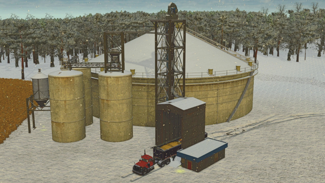 Farming Simulator 25 mod: American Pig Feed Mill v1.0.0.0, a large feed processing structure with silos during winter in FS25.