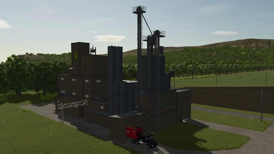 Farming Simulator 25 mod: Central Ethanol and Feed industrial plant with silos and a truck, part of FS25 mods collection.
