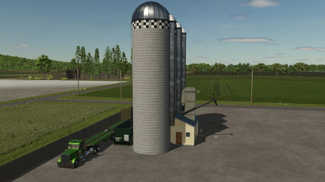 Farming Simulator 25 mod: Image of the Central Ethanol and Feed station with silos, truck, and feedmill building in the background.