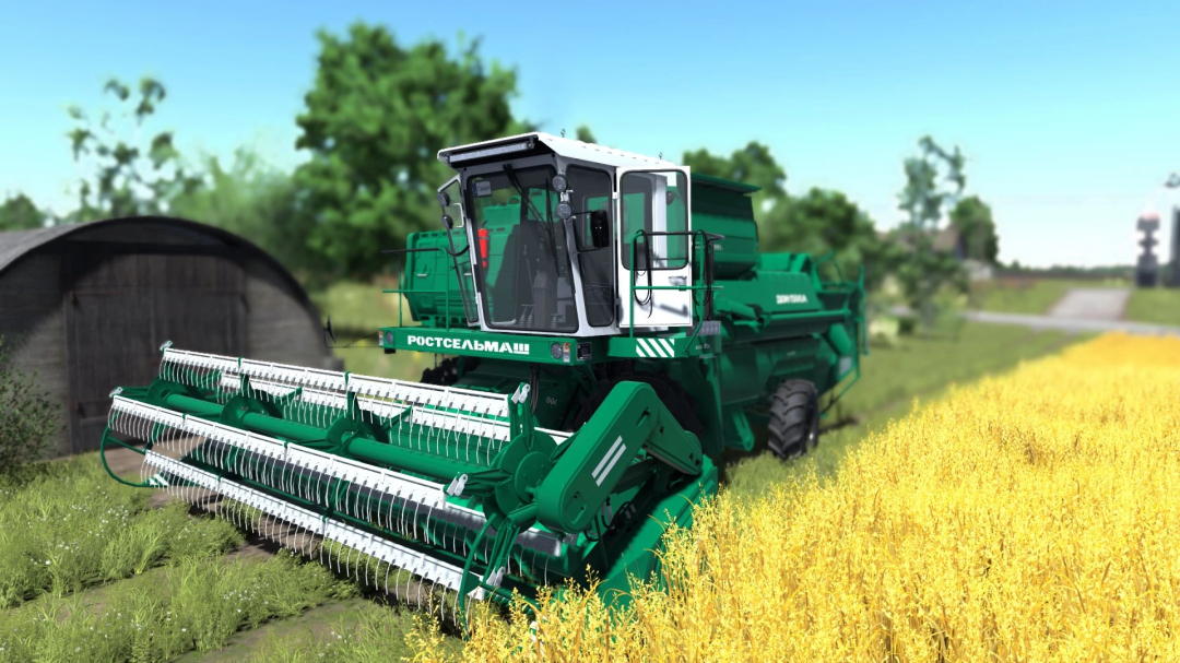 Farming Simulator 25 mod featuring a green Don 1500 harvester working on a wheat field with a farm building in the background