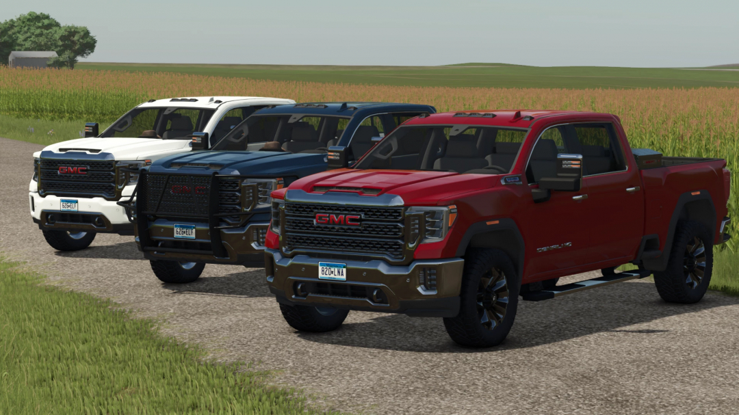 Three GMC Sierra Denali 2500 trucks from FS25 mods parked on a dirt road in Farming Simulator 25.