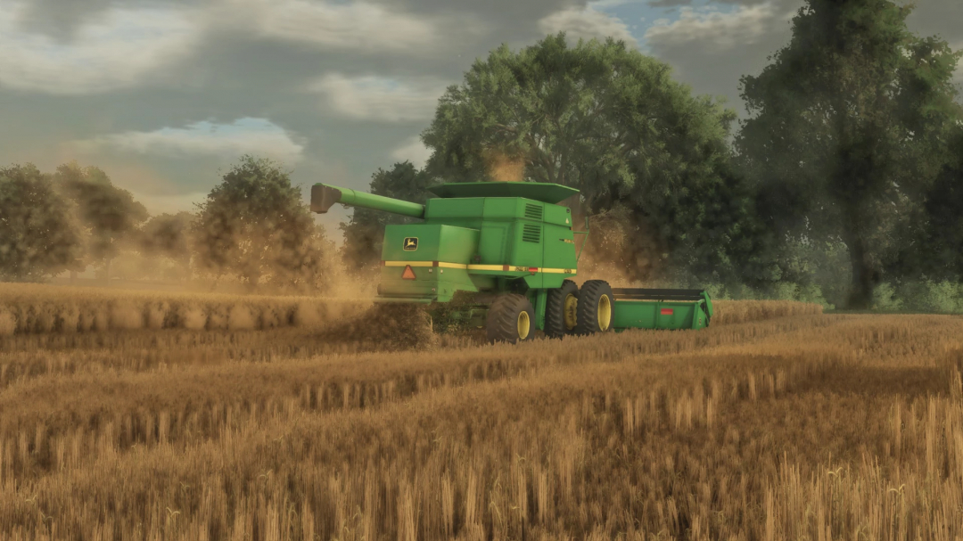 Farming Simulator 25 mod showcasing a green John Deere 930 harvester working in a wheat field.