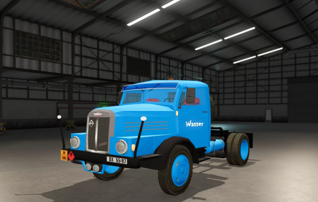 Farming Simulator 25 mods: IFA s4000 water tanker truck inside a warehouse with blue paint and water logo.