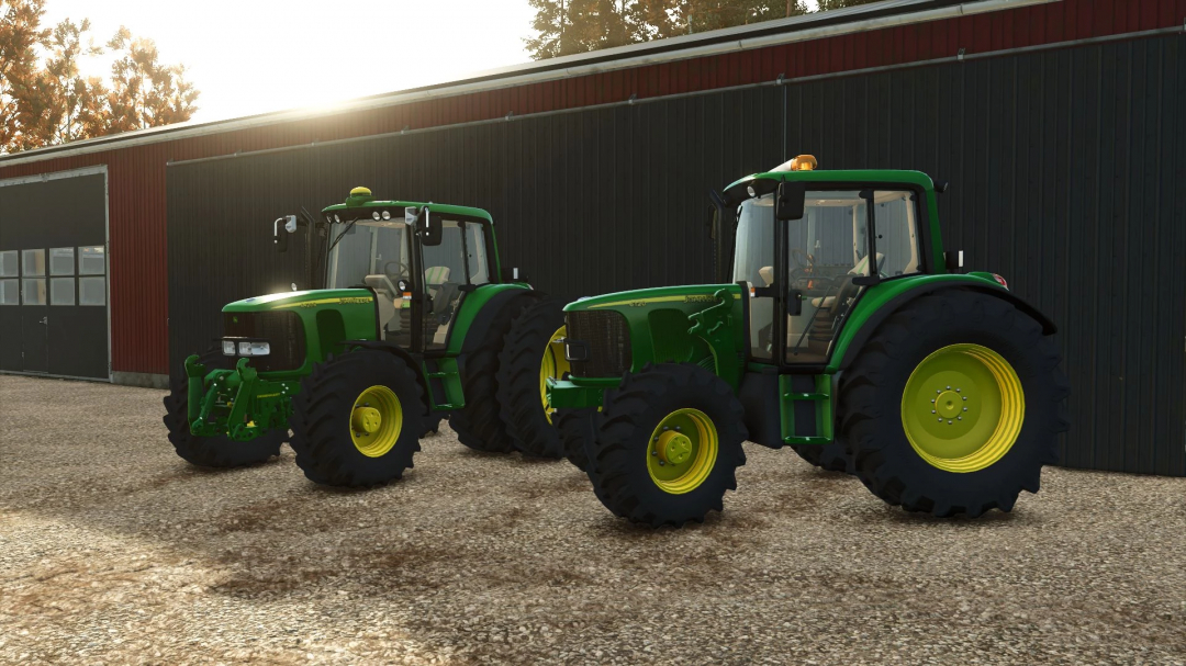 Two John Deere tractors with green bodies and yellow wheels, part of FS25 mods, displayed outside a barn in Farming Simulator 25.