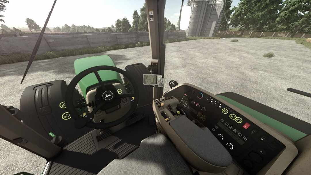 Inside view of a John Deere 8000 Series tractor from Farming Simulator 25 mods, showing the steering wheel, control panel, and GPS device.
