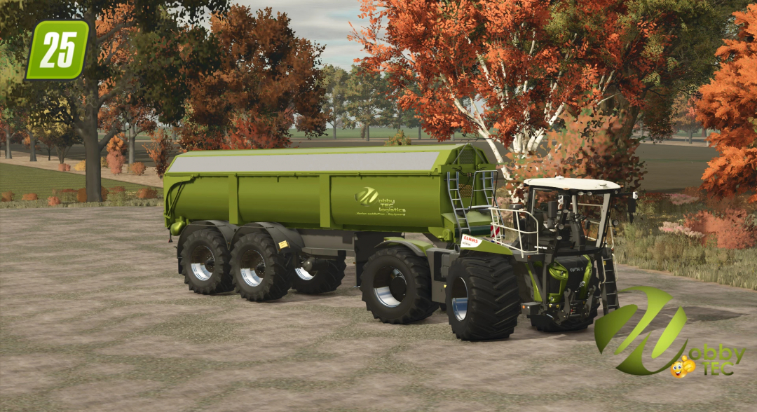 Farming Simulator 25 mod: Green SaddleTrac Trailer v1.0.0.0 hitched to a tractor on a farm with autumn trees in the background.