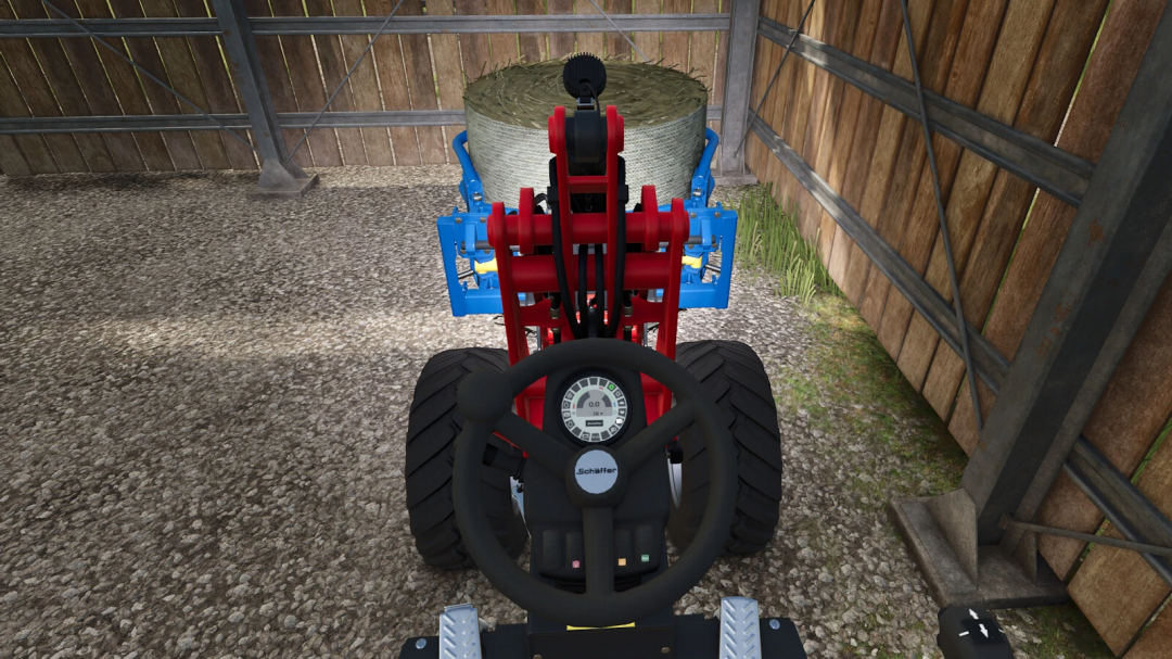 Front view of a Schäffer 2630 in Farming Simulator 25 with a round bale attachment inside a barn.