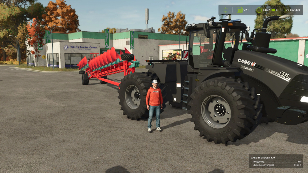 Farming Simulator 25 mod: CASE IH Steiger 470 tractor with large tires, black color, and attached plow, parked near Axle's Tractor Center.