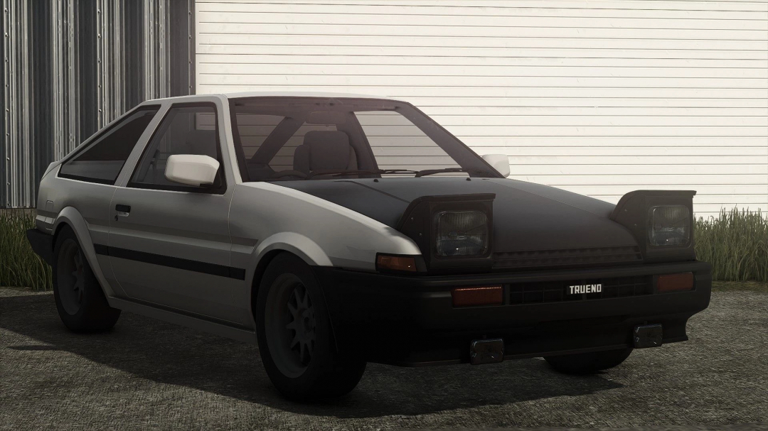 Toyota AE86 Trueno in Farming Simulator 25 mod, parked on a gravel surface next to a metal and white wall background.