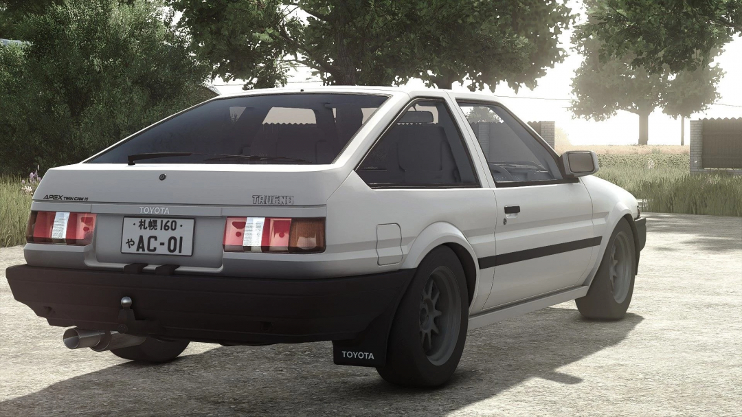 In-game image of a Toyota AE86 Trueno mod from Farming Simulator 25, featuring a classic white hatchback with black accents and Japanese license plate.